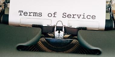 Typewriter with paper saying Terms of Service