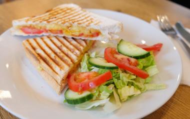 Cheese and tomato toastie with salad