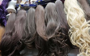 Row of wigs