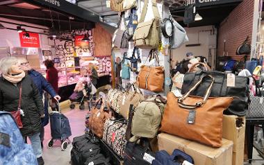 Selection of khaki and grey and brown bags