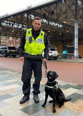 Police man with Zola the police training dog