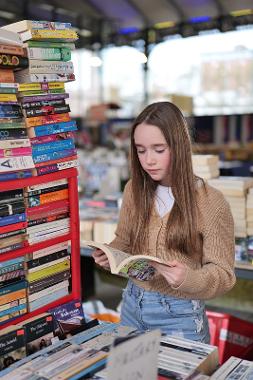 Child at The Book Stops Here book stall