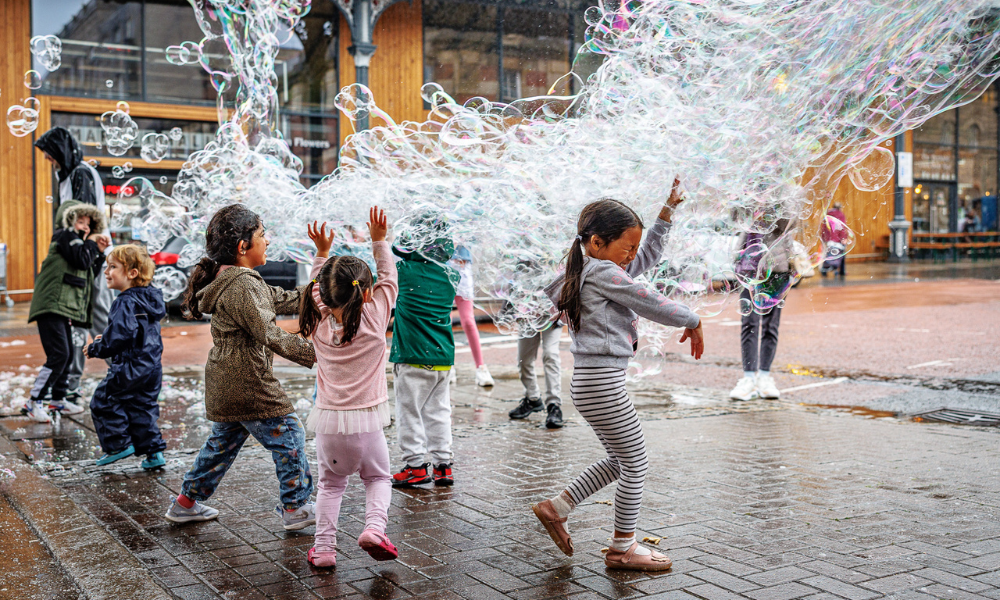 Children playing with bubbles