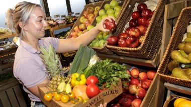 Fresh and Fruity trader with box of fruit