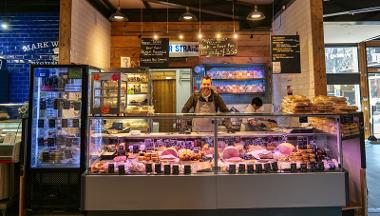 Trader behind stall