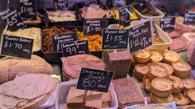 Assortment of meats behind the counter