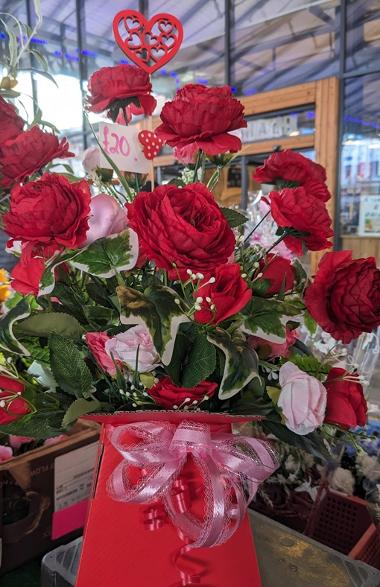 Red rose bouquet with heart decoration