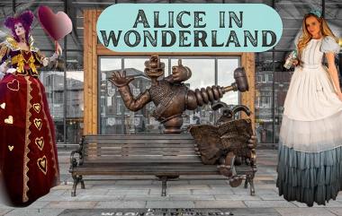 Alice in Wonderland and the Queen of Hearts outside Preston Market Hall